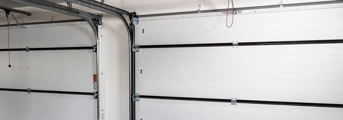 Fix Folding Garage Door Jerking in Sydney, NSW
